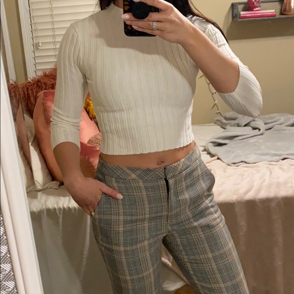 Cropped white turtleneck sweater